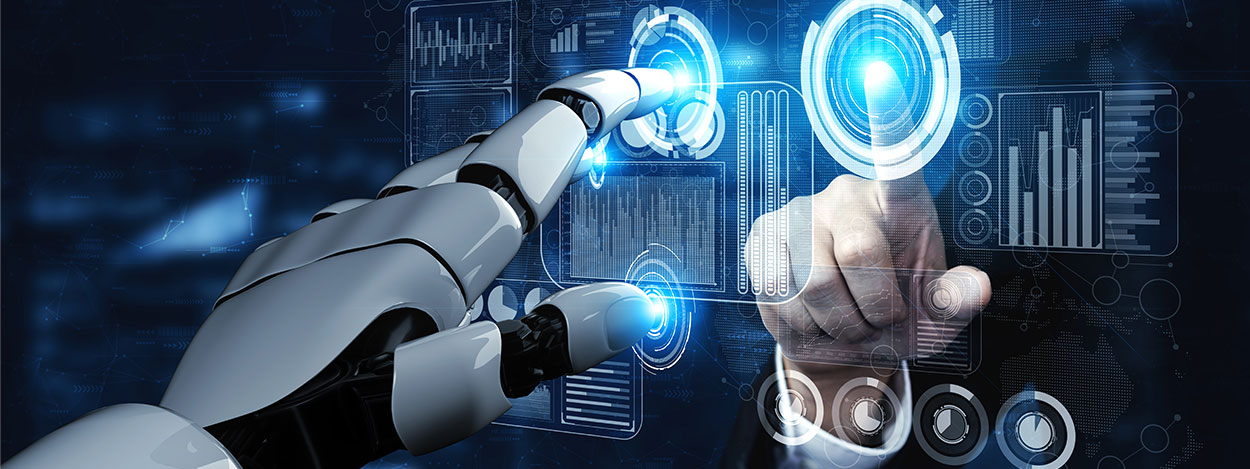 Artificial hand and human hand touching digital display